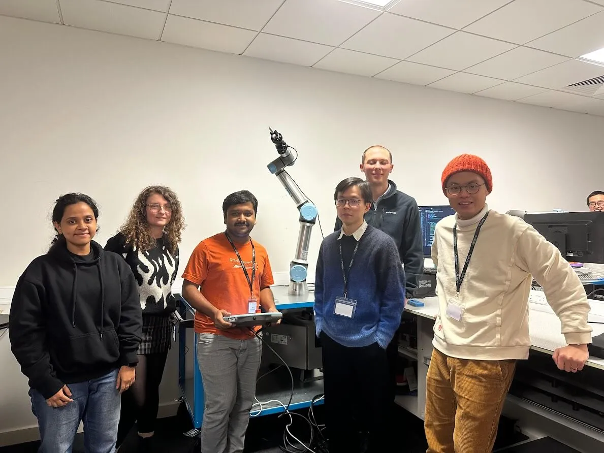 Project team group photo with the robot